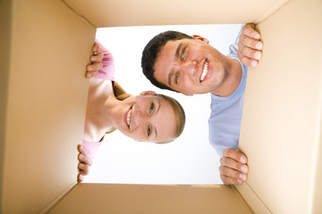 Couple lookin into box