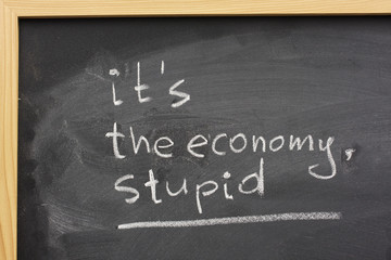 it's the economy, stupid - handwritten on a blackboard