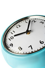 retro blue and white clock on white background