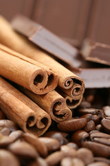 arrangement of chocolate coffee and cinnamon sticks