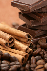 arrangement of chocolate coffee and cinnamon sticks
