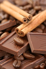 arrangement of chocolate coffee and cinnamon sticks