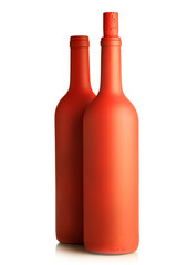 Red bottles cilose-up isolated over white background