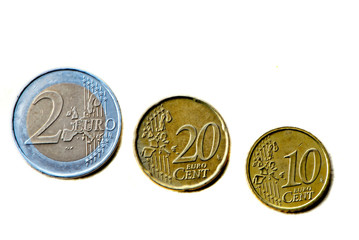 three coins of euro on  white background