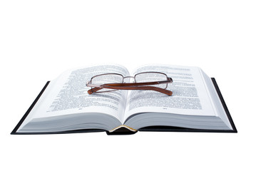 The opened book on which glasses lay