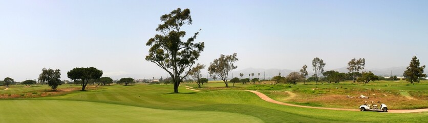 Obraz na płótnie Canvas Panoramic shot of a golf fairway near Ventura