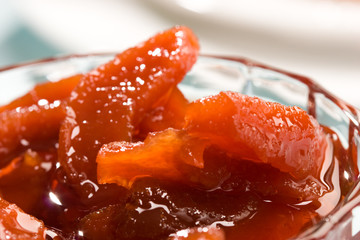food sereis: candied quince jam in glass