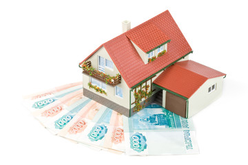 Miniature House and Money..Buying house concept
