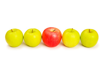 Stand out from crowd concept with apples isolated on white