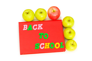 Back to school concept with books and apple