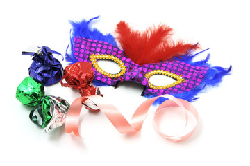 Party Mask and Chocolate Lollies on White Background