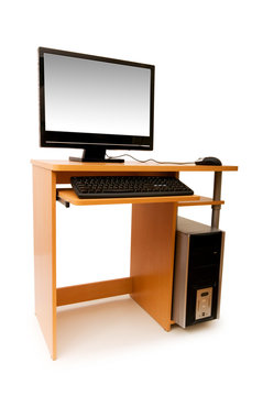 Computer  and desk isolated on the white