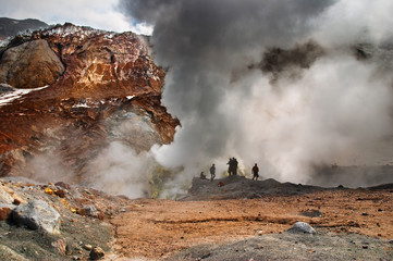 People inside active volcanic crater - obrazy, fototapety, plakaty