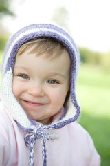 portrait of sweet baby girl in park