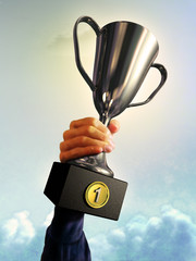 Male hand holding a trophy. Digital illustration.