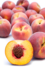 fresh peaches on white background