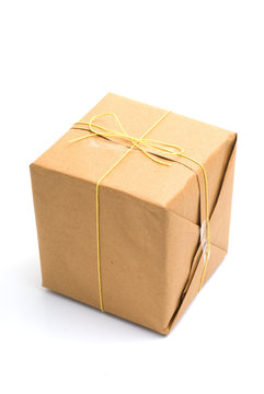 Parcel wrapped in brown paper and tied.
