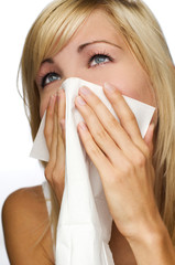young blond woman having a cold close up