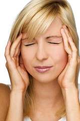 young blond woman having a headache close up