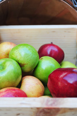 A wooden crate of apples