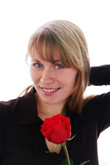 Beautiful young smiling woman with red rose