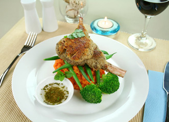 Crumbed lamb cutlets on green beans and potato mash
