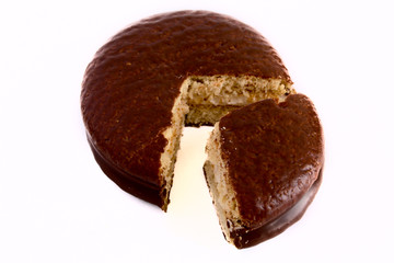 Cookies in chocolate glaze with the cut out sector