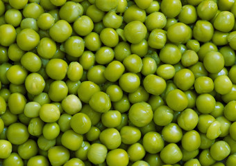 Green peas close-up may be used as background or texture