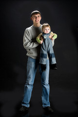 Young man with his little son