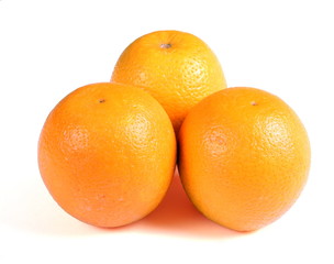 three oranges on white background