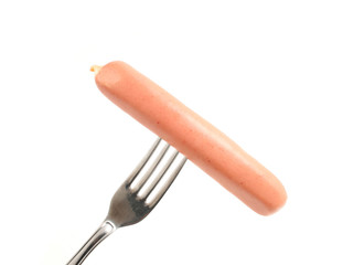 sausage on fork isolated on white