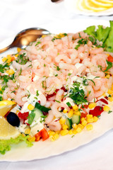 garnish shrimps and corn on a dish, restaurant