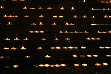 very romantic candles background in the church