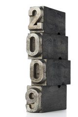 old lead letters forming 2009 on white