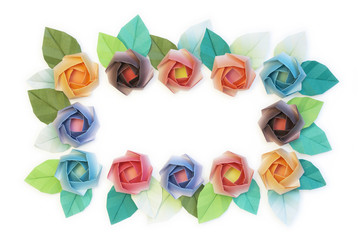 12 origami roses decoration on a white background