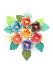 7 origami roses decoration on a white background