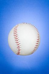 baseball against blue gradient background