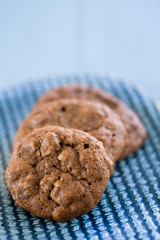 closeup on three health chocolate cookies