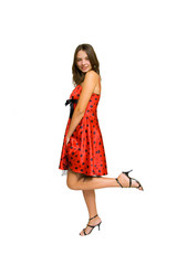 Portrait of a beautiful woman in red dress, isolated on white