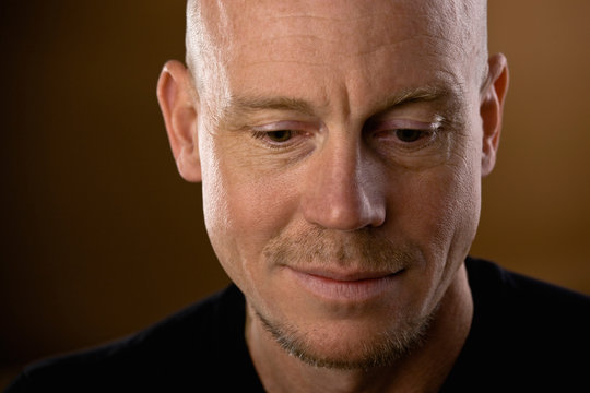 Studio Shot Of Bald Man With Goatee And Mustache