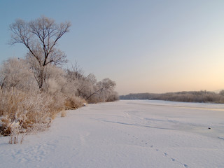 On ice of the frozen river Ussuri