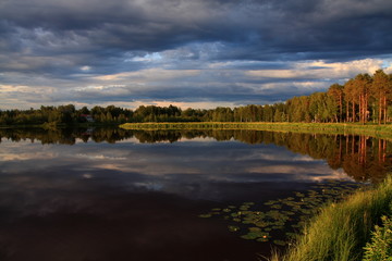 Lake at sunset with reflection in Finland