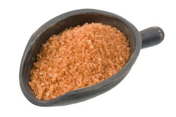 scoop of  Hawaiian alaea sea salt containing red clay