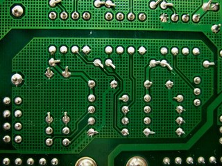 Close up of board with communication cicuits and jumpers