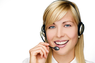 Fototapeta premium young blond woman with headset close up