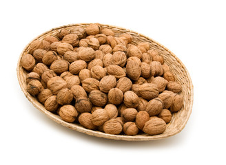 basket of walnuts harvest on white background