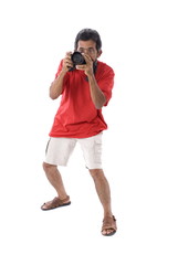 Photographer taking photos on white background .