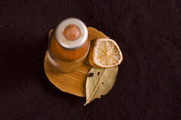 red pepper, dry lemon and leaf of laurel