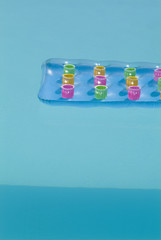 inflatable mattress on  the  pool