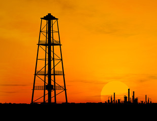 Oil pump silhouette over orange sky - 9698625